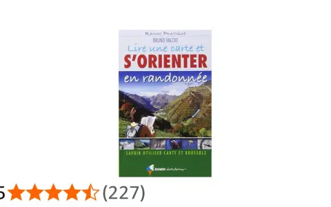 Livre "Lire une carte et s'orienter en randonnée" montrant des massifs montagneux, une personne consultant une carte et des sentiers.